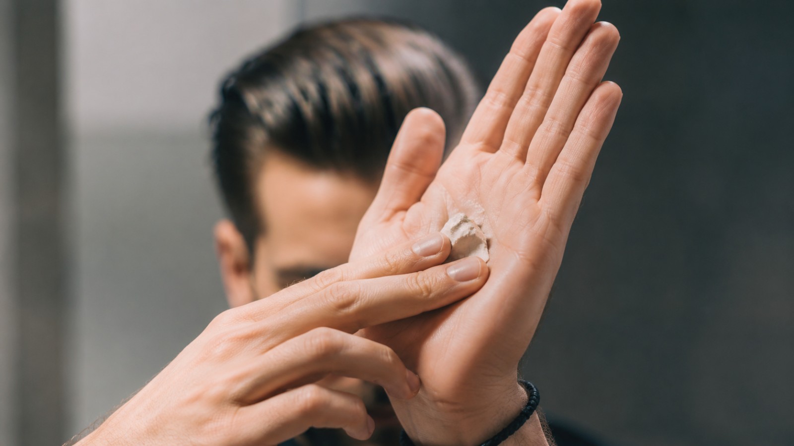 Warm the product between your palms until it almost disappears before it ever touches your hair.