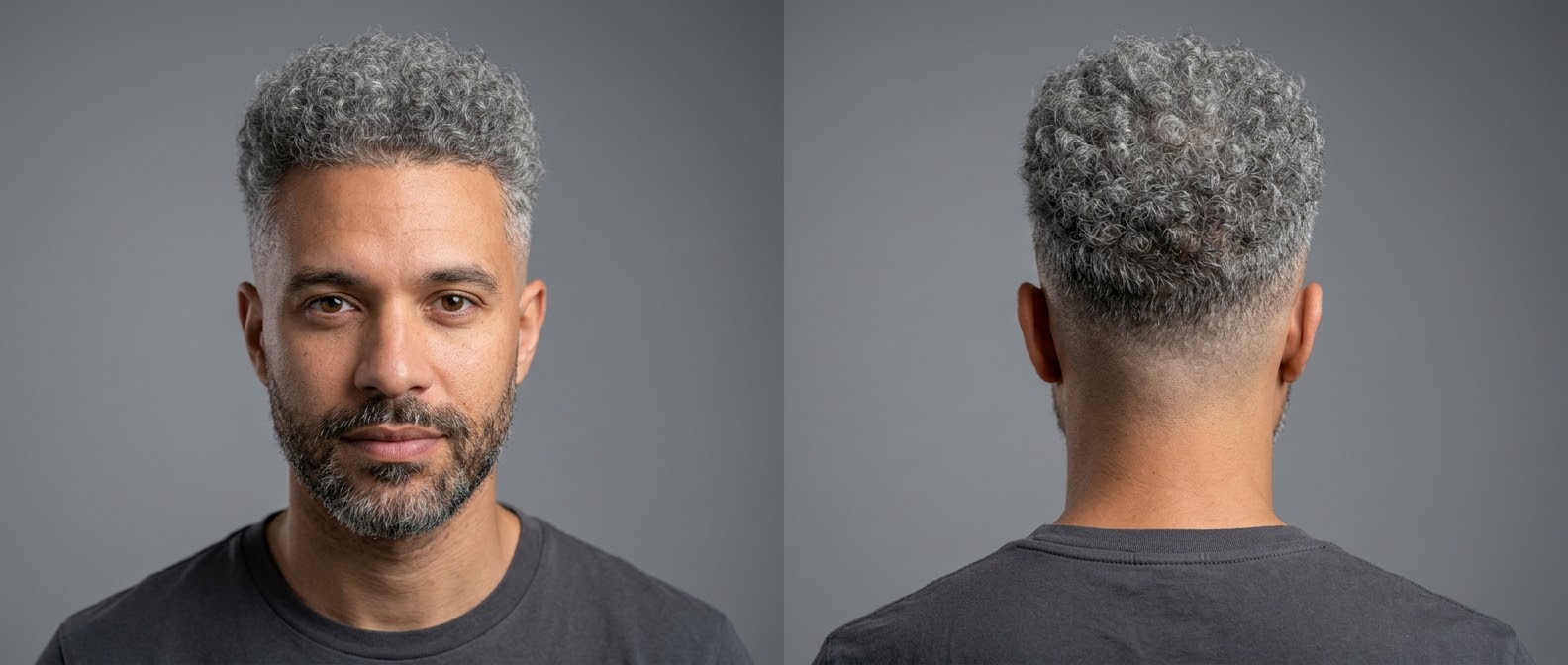 A man with a silver high fade haircut and short, tightly coiled gray curls on top, paired with a neatly trimmed short beard.